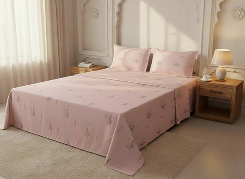 AthSVi Alayam blush pink floral print bed sheet set with matching pillowcases on a made bed in a serene bedroom.