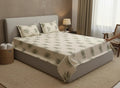 AthSVi Alayam botanical print cotton bed sheet set with green palm leaves on a cream background in a bedroom.